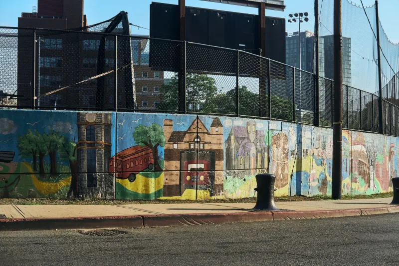 Walls That Witness: How Community Muralists Are Rewriting Urban History in Plain Sight